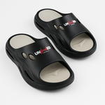 Black ergonomic men’s slides with cushion footbed