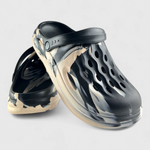 Bold flame-accent slides that add a touch of heat to your outfit