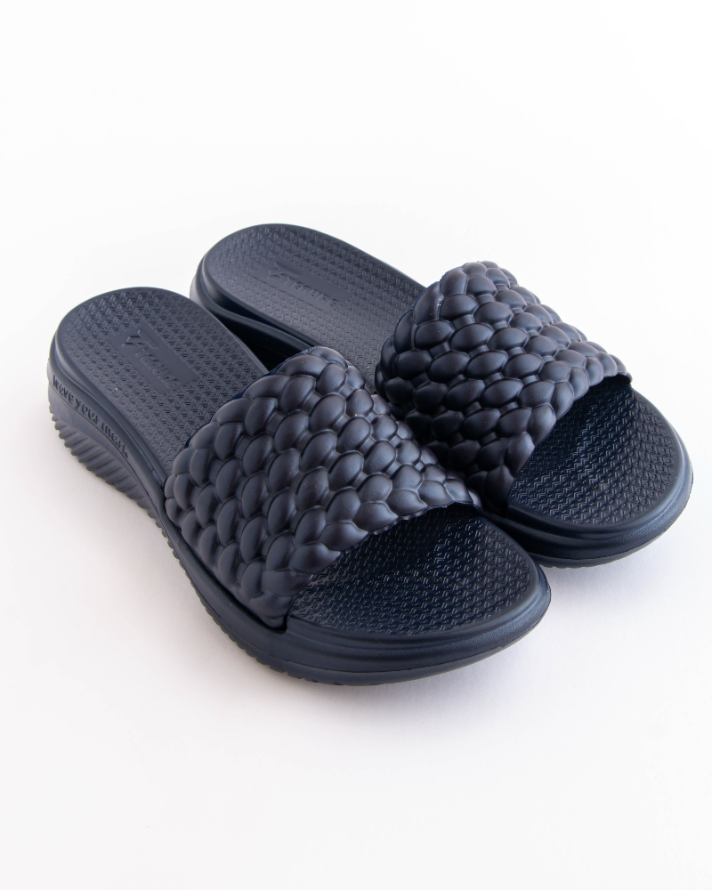 Pair of dark gray woven sandals on a white background