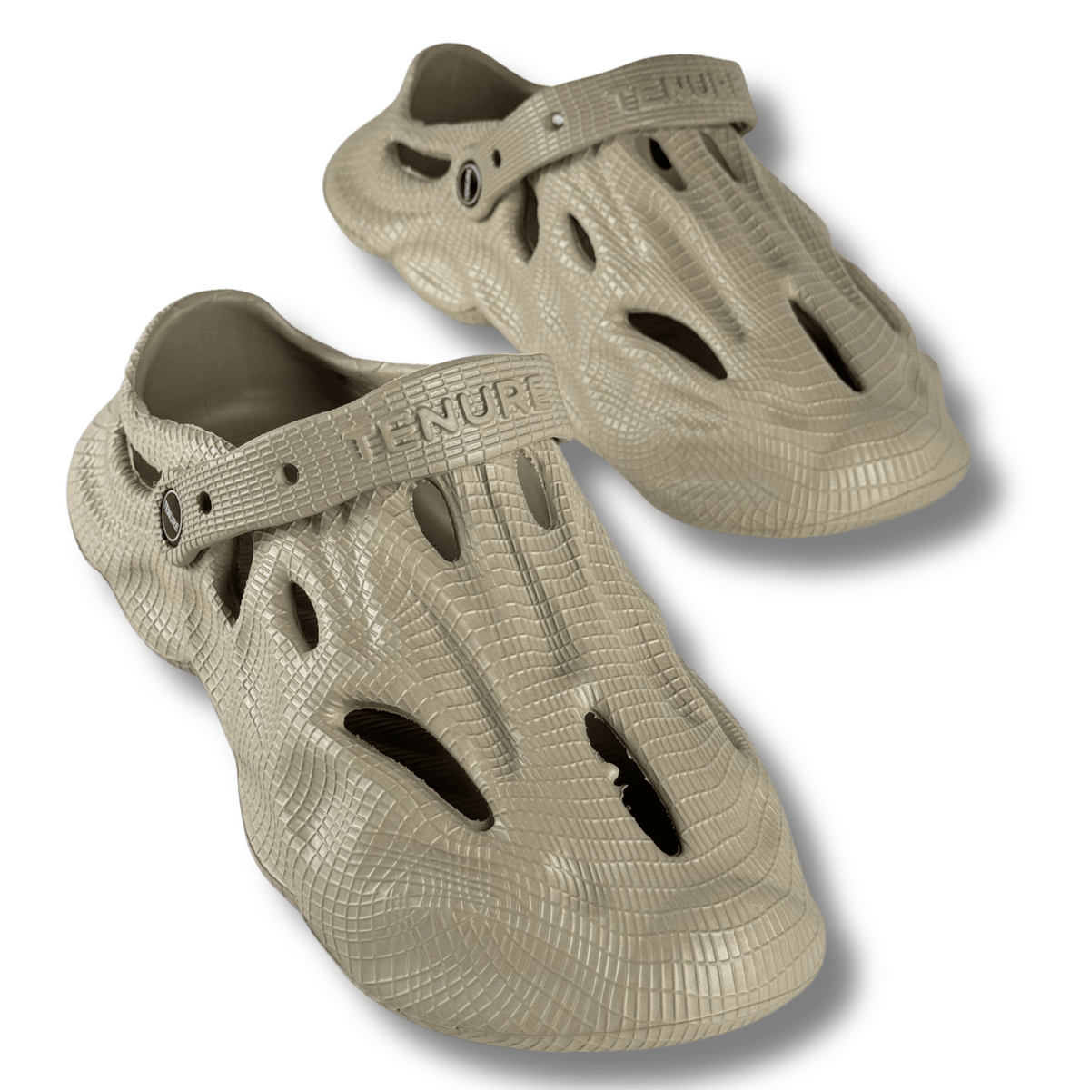 Pair of beige sandals with a textured surface on a white background